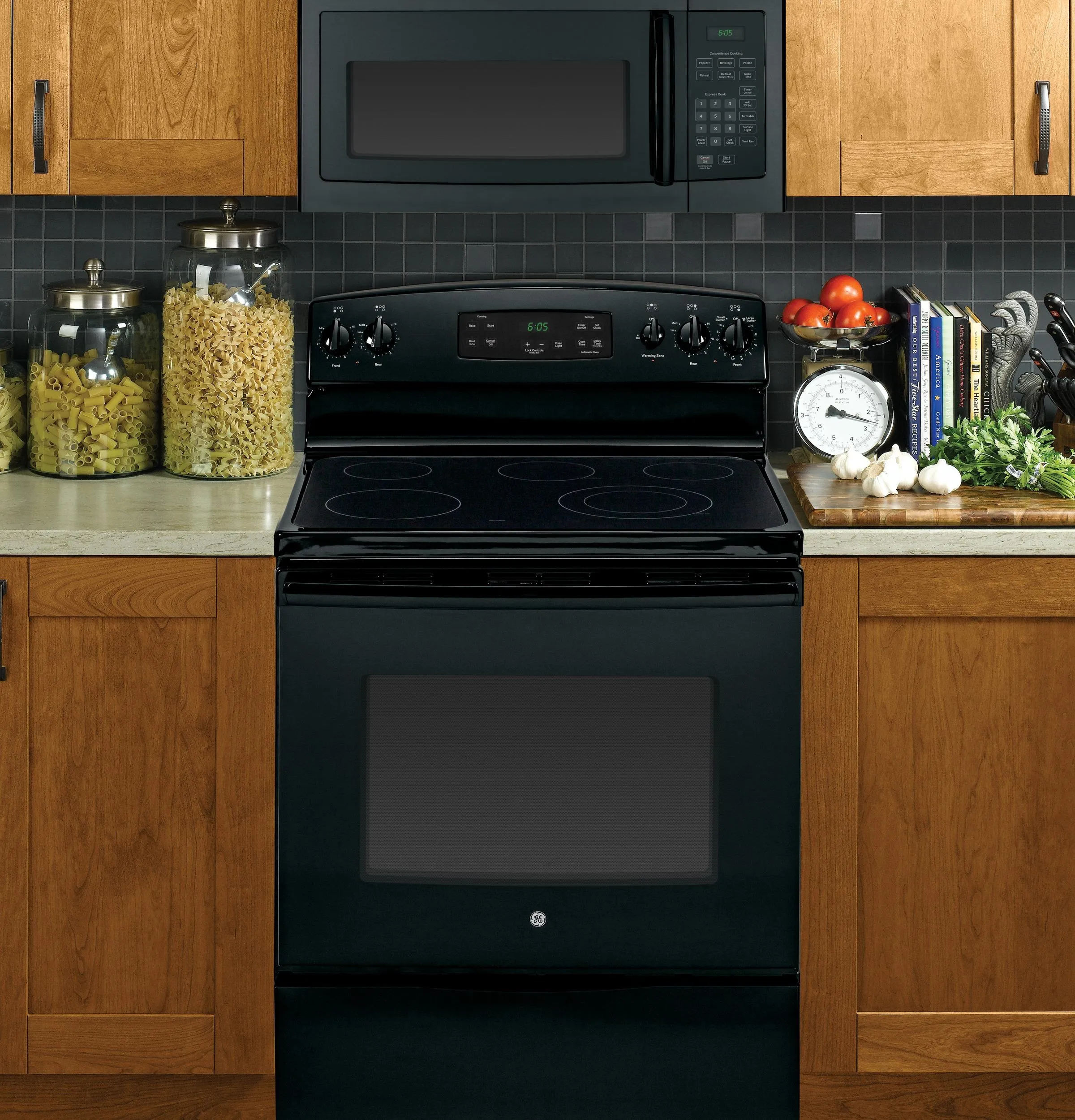 JVM3160DFBB GE® 1.6 Cu. Ft. Over-the-Range Microwave Oven